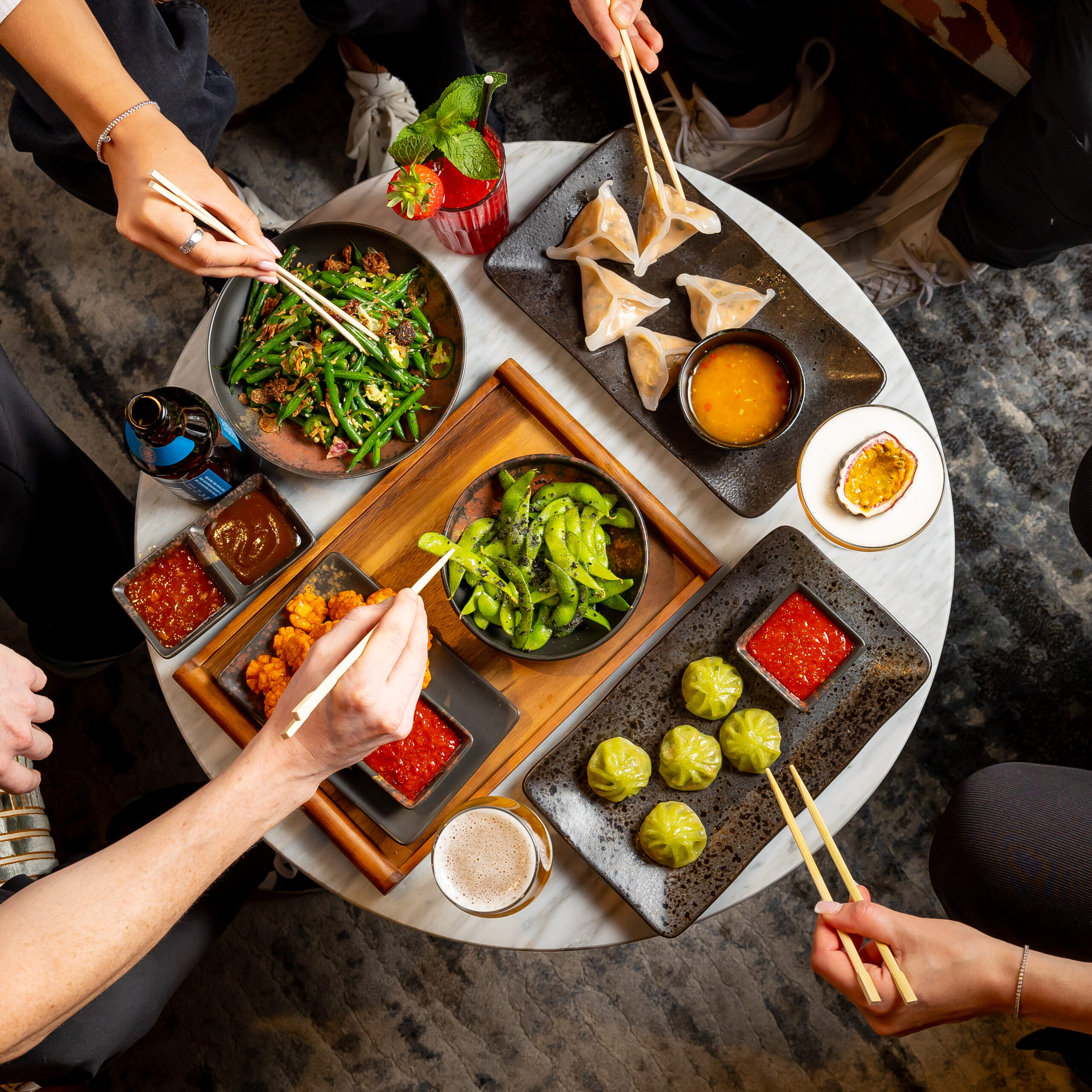 Friends eating Asian food